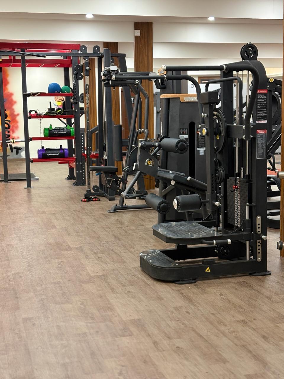 Inside Liger Fitness Vellimadukunnu - training area and premium equipment